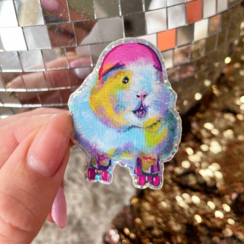 Holohraphic glitter sticker with roller skating guinea pig on a disco ball and sequin back ground