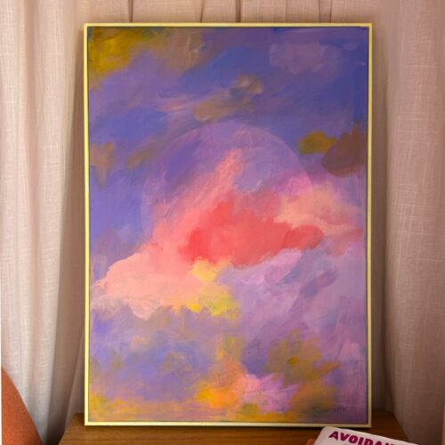 abstract moon painting in a yellow frame