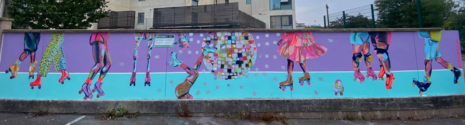 Lilac and blue, roller skating mural with large disco ball