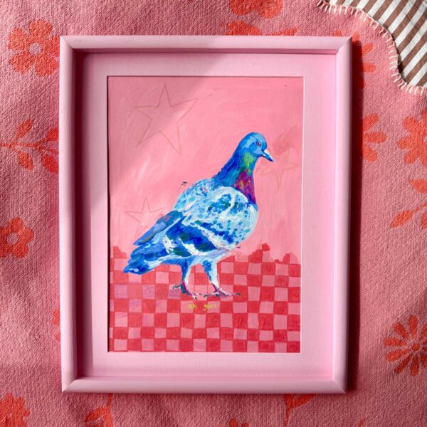 Pink pigeon art print on a checkerboard background with stars. Framed in a pink frame
