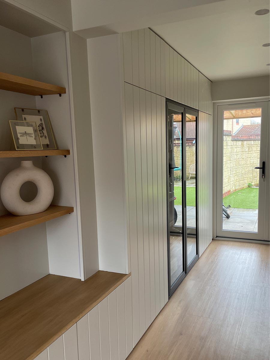Neutral storage and bar in dining room
