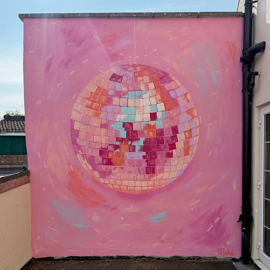 Pink disco ball mural